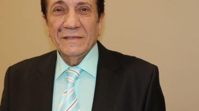 Here is the rewritten text in Turkish: Başlık: İzzet Altınmeşe,